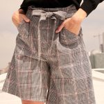A Pair Of Wide Woven Plaid Shorts