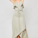 A Knit Top With Deep V Neckline And Yoke Design
